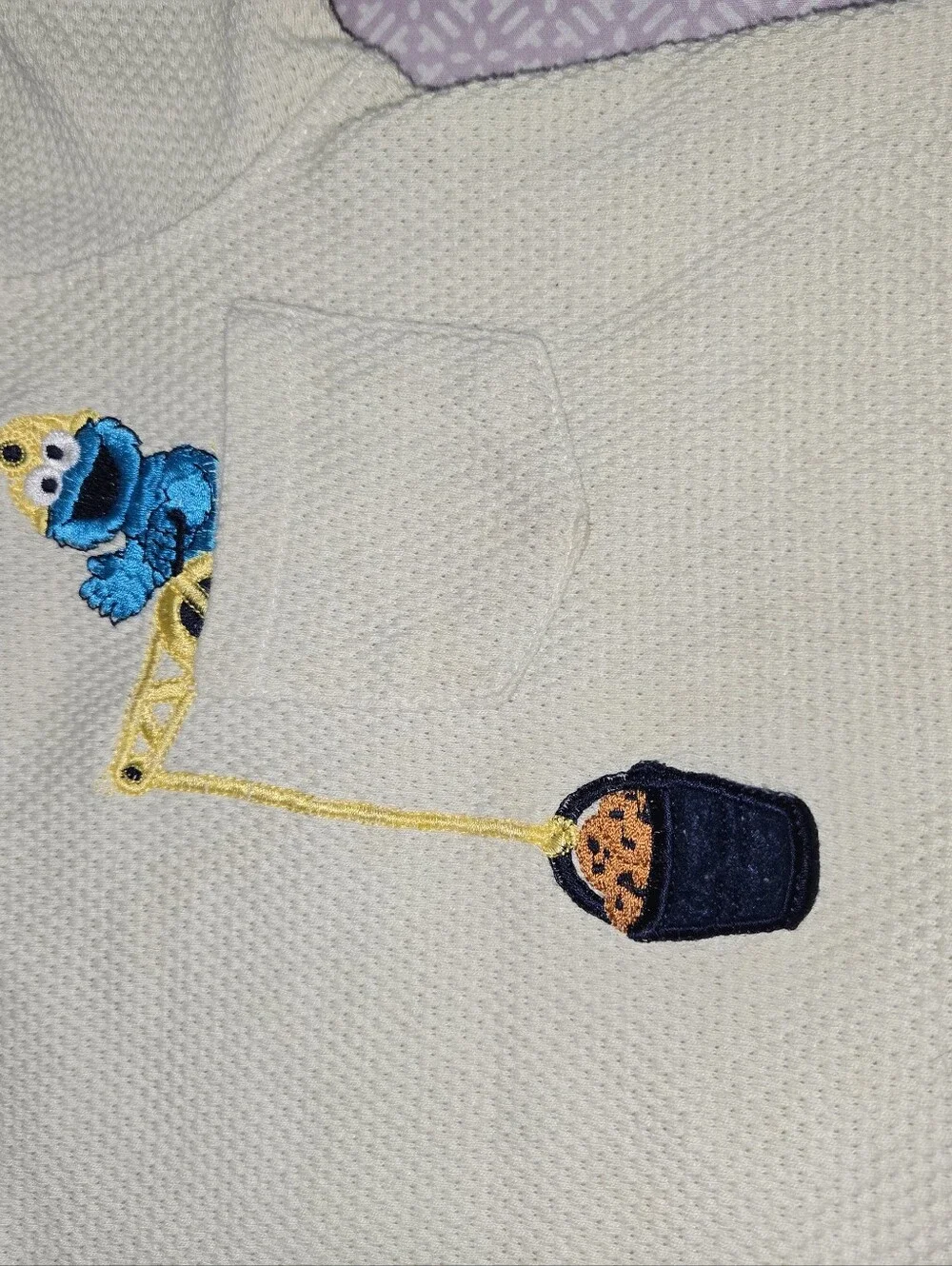 Sesame street cookie, monster onesie.